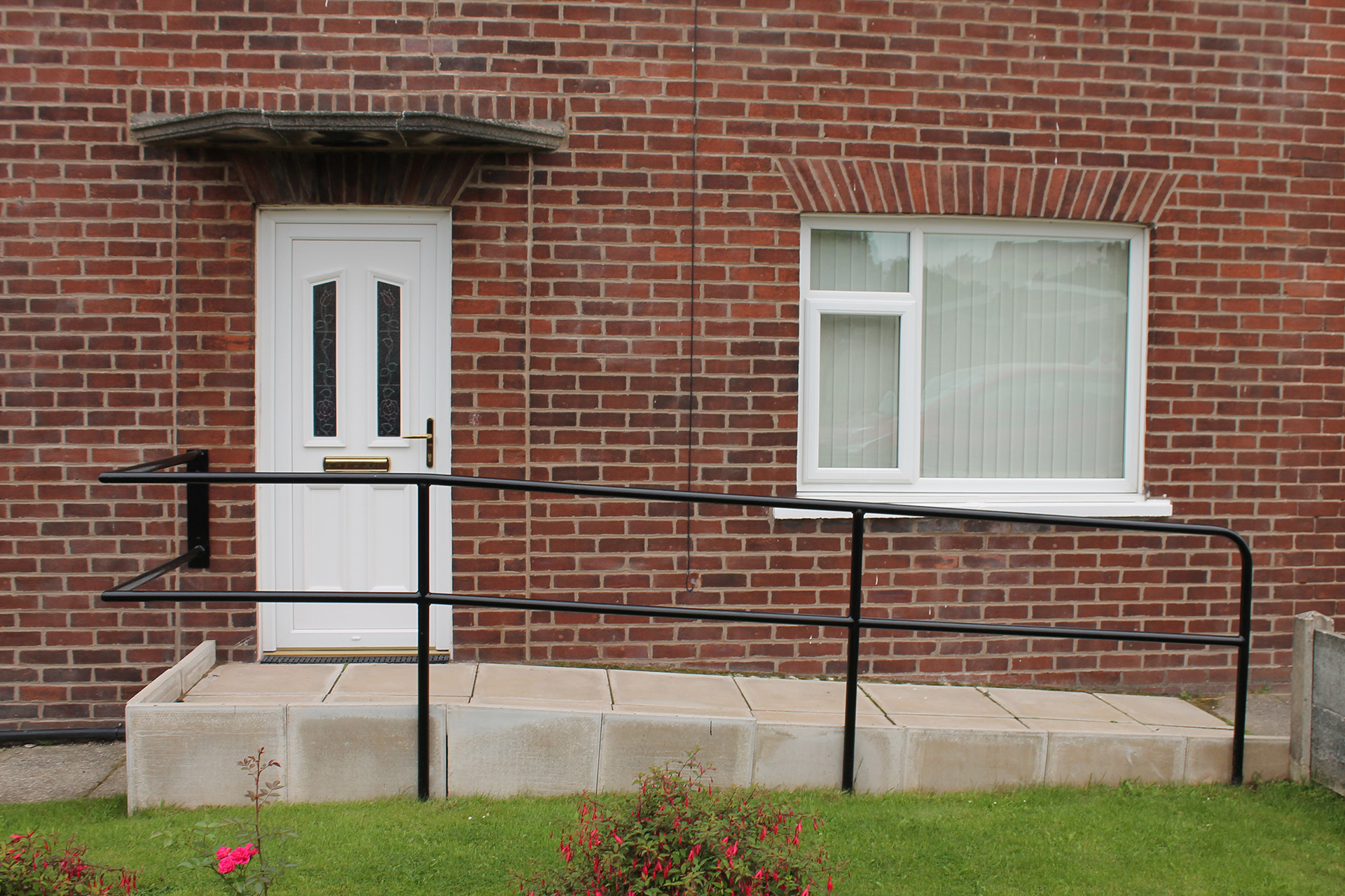 A wheel chair ramp outside a home outlining available disability support to veterans through Disabled Facilities Grants.