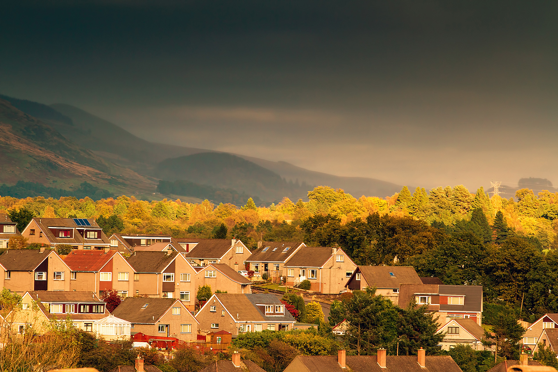 Aerial view of houses in Scotland, showing how veterans can get help with buying a home in Scotland on the open market.
