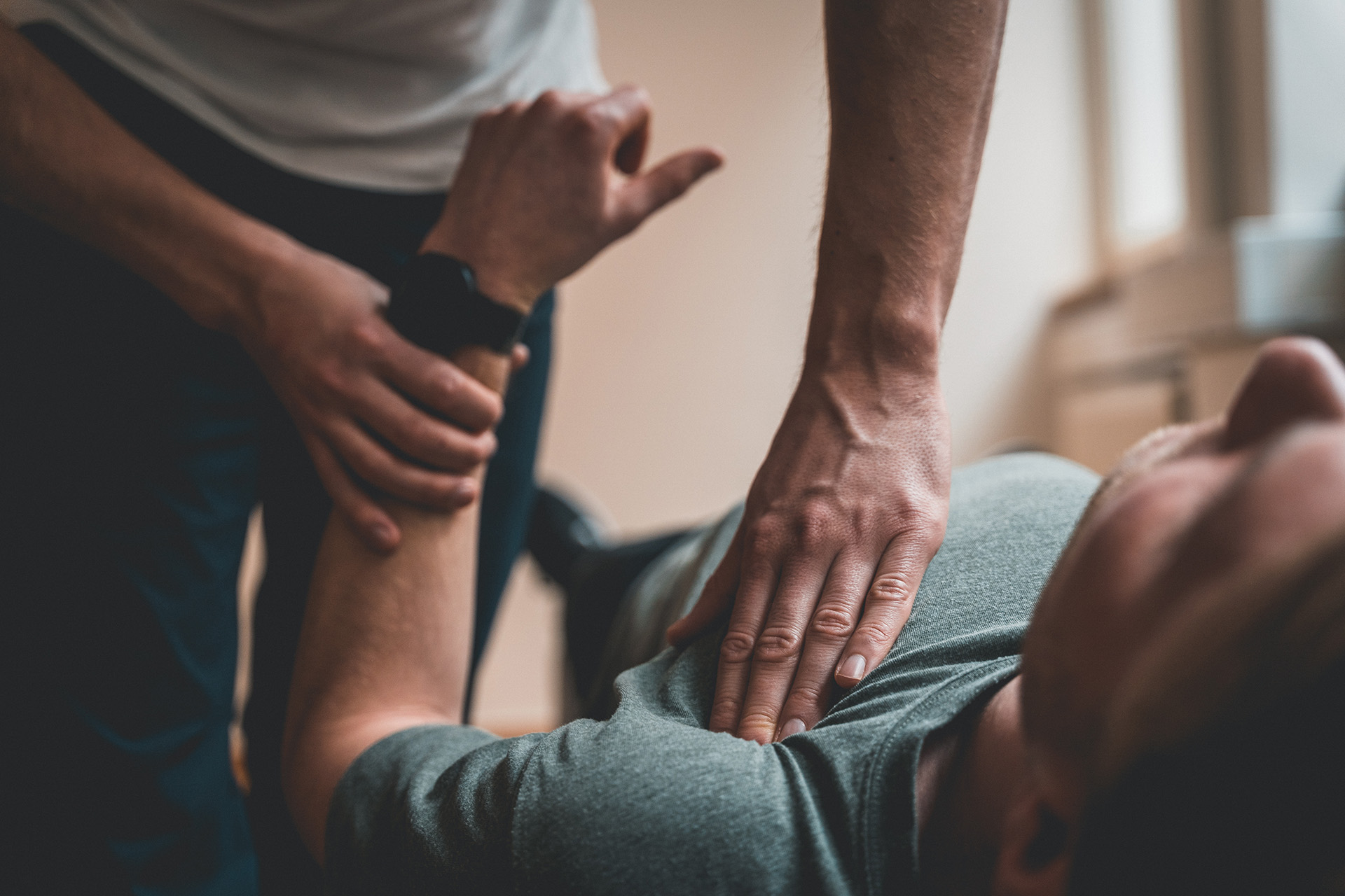 Physiotherapist treating a veteran for an armed forces injury. 