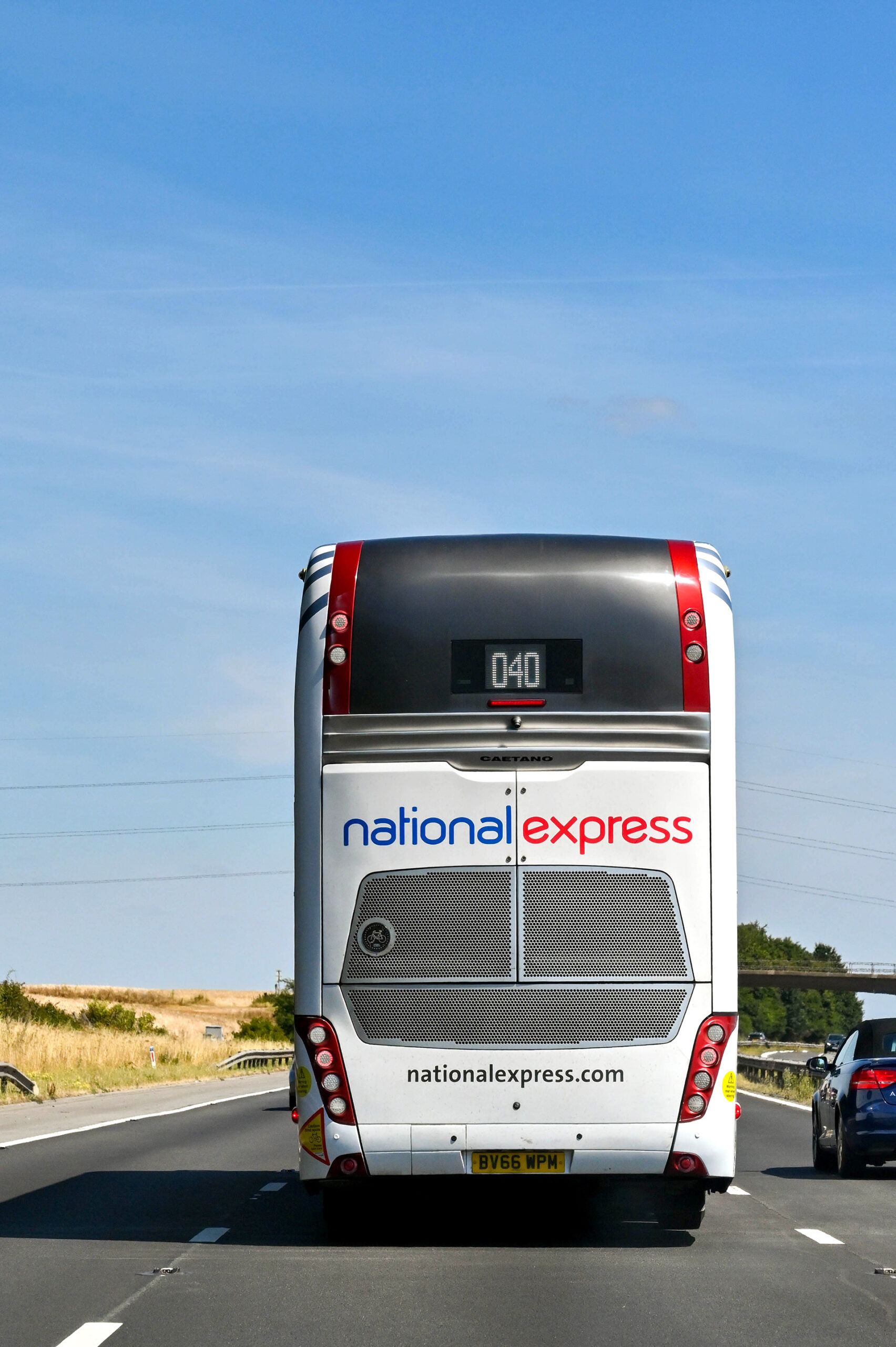 A National Express bus, showing armed forces discounts for veterans when travelling with National Express.